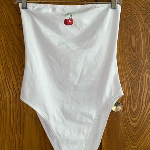 Size small, button body suit